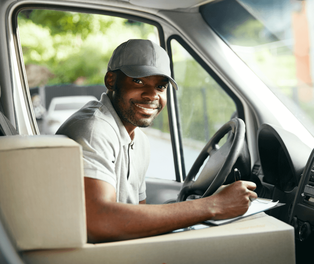 Delivery man behind the steering wheel